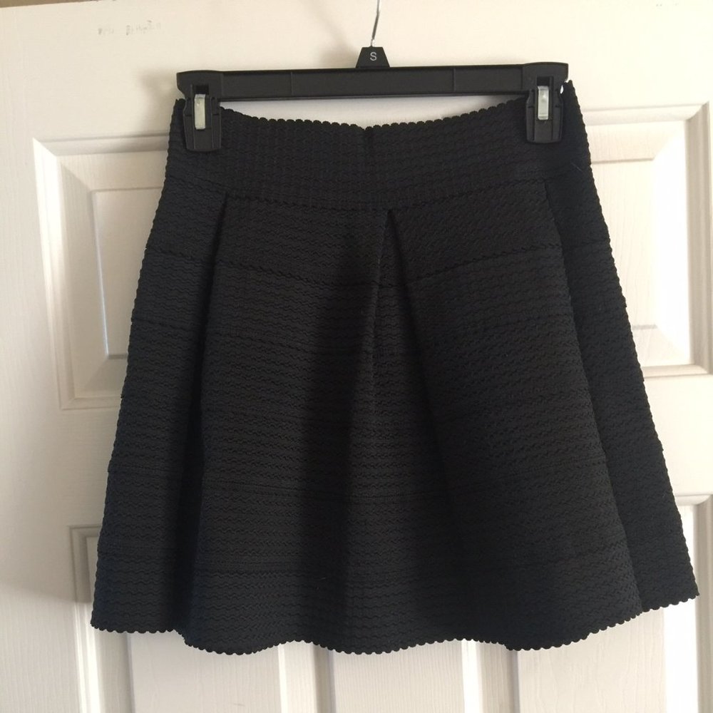 Chic black textured, structured mini skirt